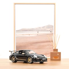 1:18 Масштабная модель PORSCHE 911 GT3 RS Coupe (997 II) 2009 Black/Gold Metallic