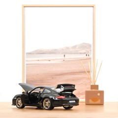 1:18 Масштабная модель PORSCHE 911 GT3 RS Coupe (997 II) 2009 Black/Gold Metallic