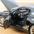 1:18 Масштабная модель PORSCHE 911 GT3 RS Coupe (997 II) 2009 Black/Gold Metallic
