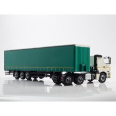 1:43 Масштабная модель КАМАЗ-65206 с полуприцепом НЕФАЗ-93341