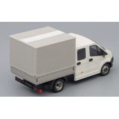 1:43 Масштабная модель ГАЗель NEXT A22R23 бортовой c тентом, белый / серый