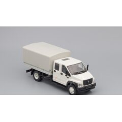 1:43 Масштабная модель ГАЗон C42R33 бортовой (с тентом), белый / серый